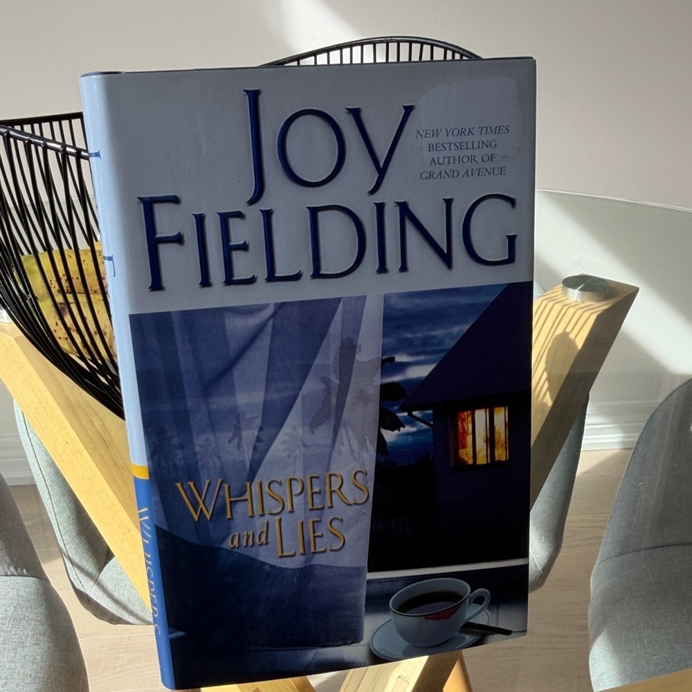 Joy Fielding "Whispers and Lies" Hardcover Book - Blue